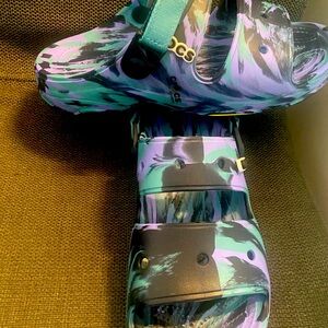 Unisex crocs.  Women’s 11 and men’s 9